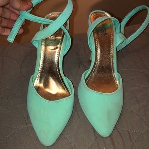 Teal pointy heels
